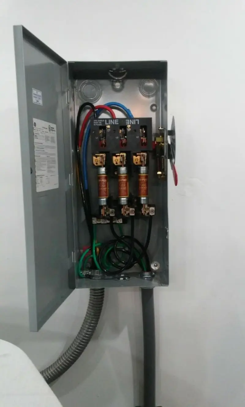 Three-phase disconnect switch installed for Smoke Detector Installation in Crowley